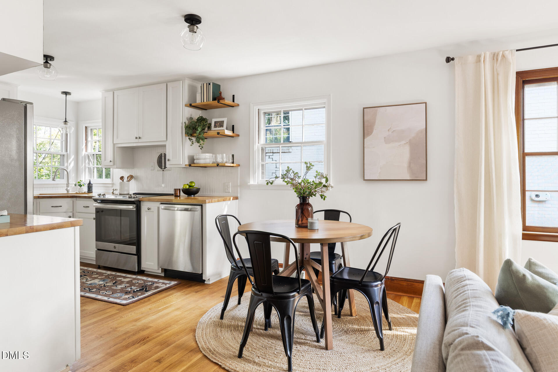 1414 Acadia Street Durham, NC 27701 - Photo 11 of 46 a dining room with furniture and window