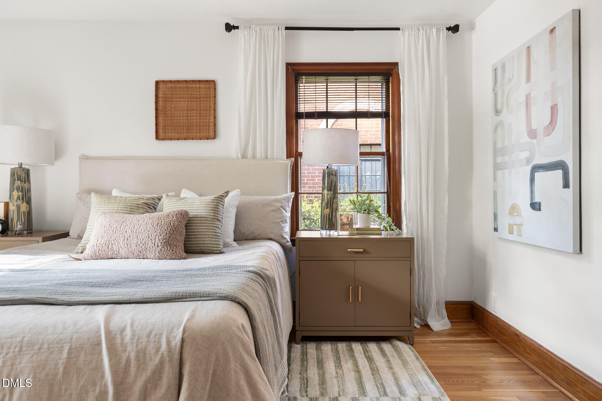 1414 Acadia Street Durham, NC 27701 - Photo 21 of 46 a bedroom with a bed and a window