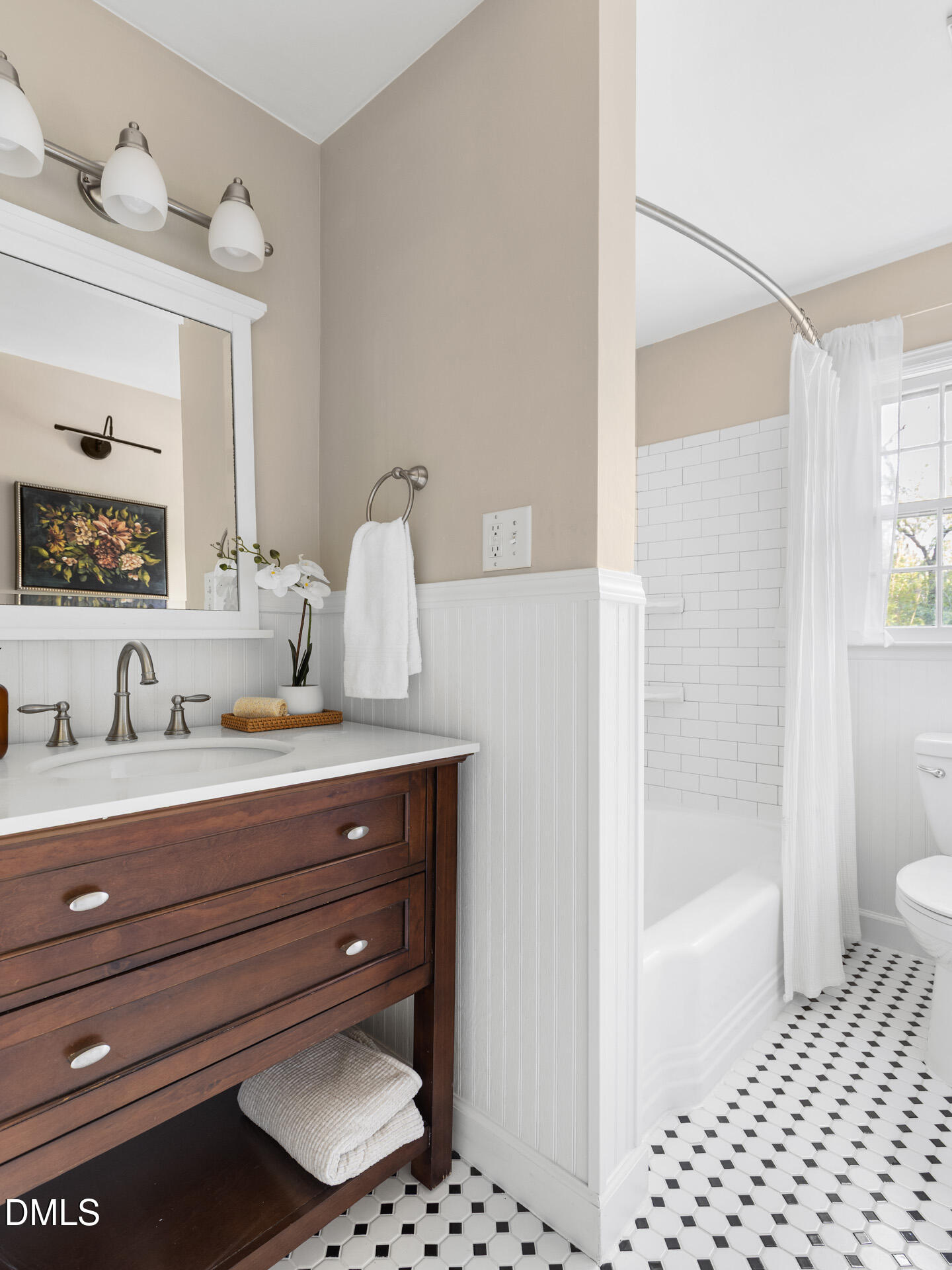 1414 Acadia Street Durham, NC 27701 - Photo 25 of 46 a bathroom with a sink a toilet and shower