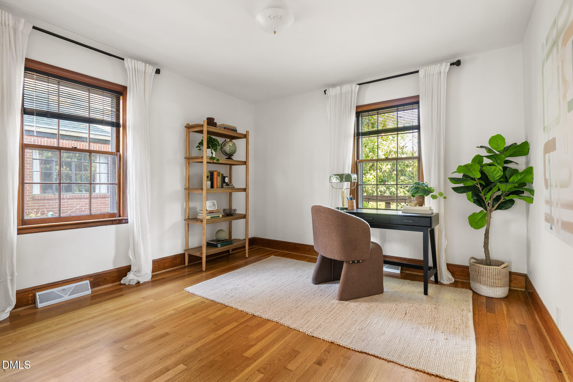 1414 Acadia Street Durham, NC 27701 - Photo 26 of 46 a workspace with furniture and a potted plant