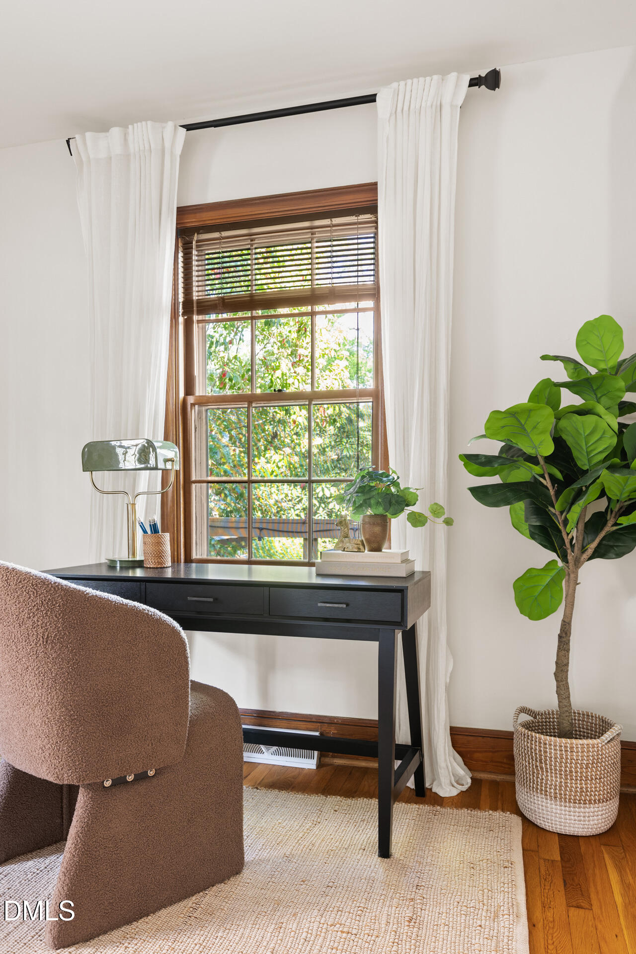 1414 Acadia Street Durham, NC 27701 - Photo 27 of 46 a living room with furniture and a potted plant
