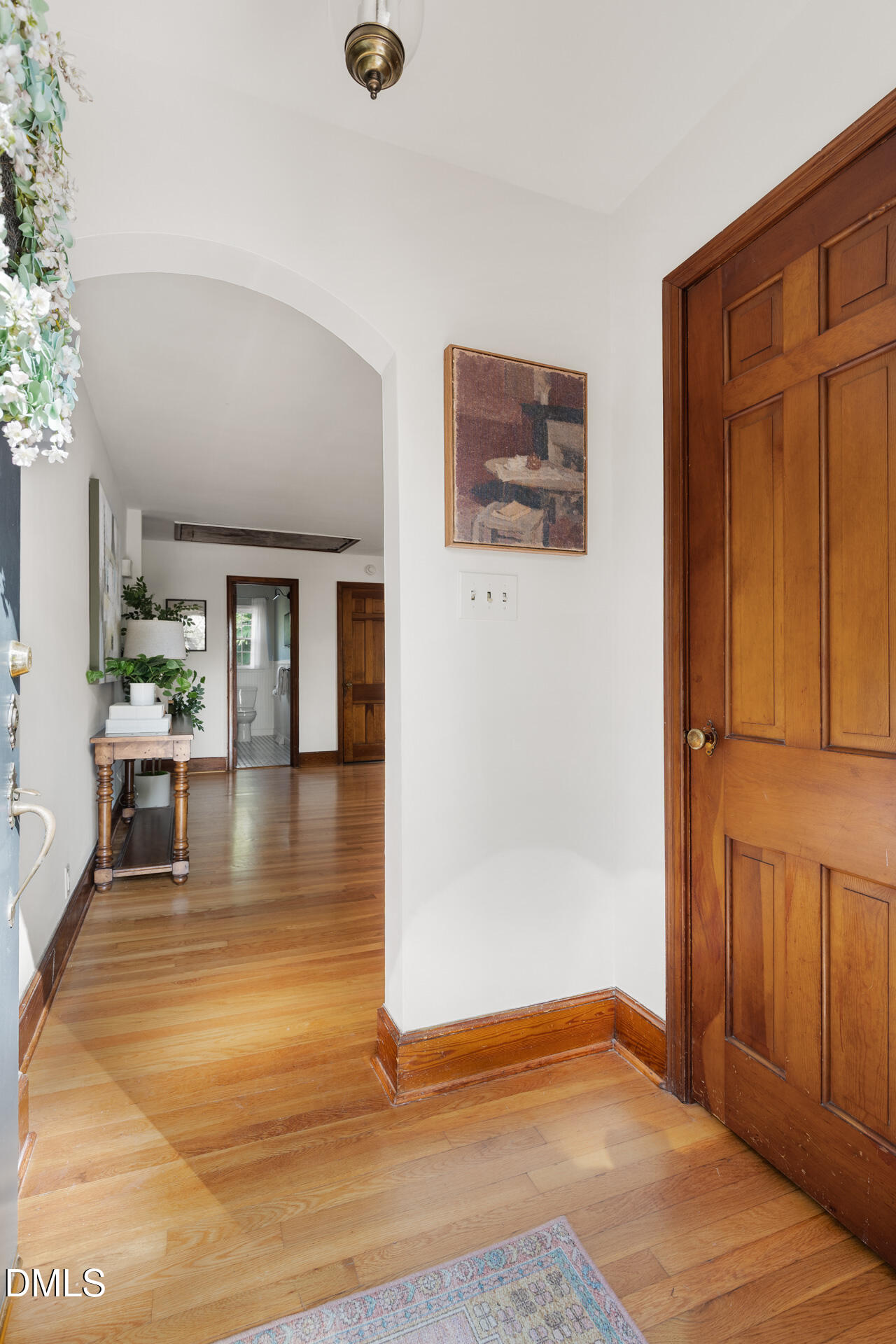 1414 Acadia Street Durham, NC 27701 - Photo 5 of 46 a view of a livingroom with wooden floor and a hallway