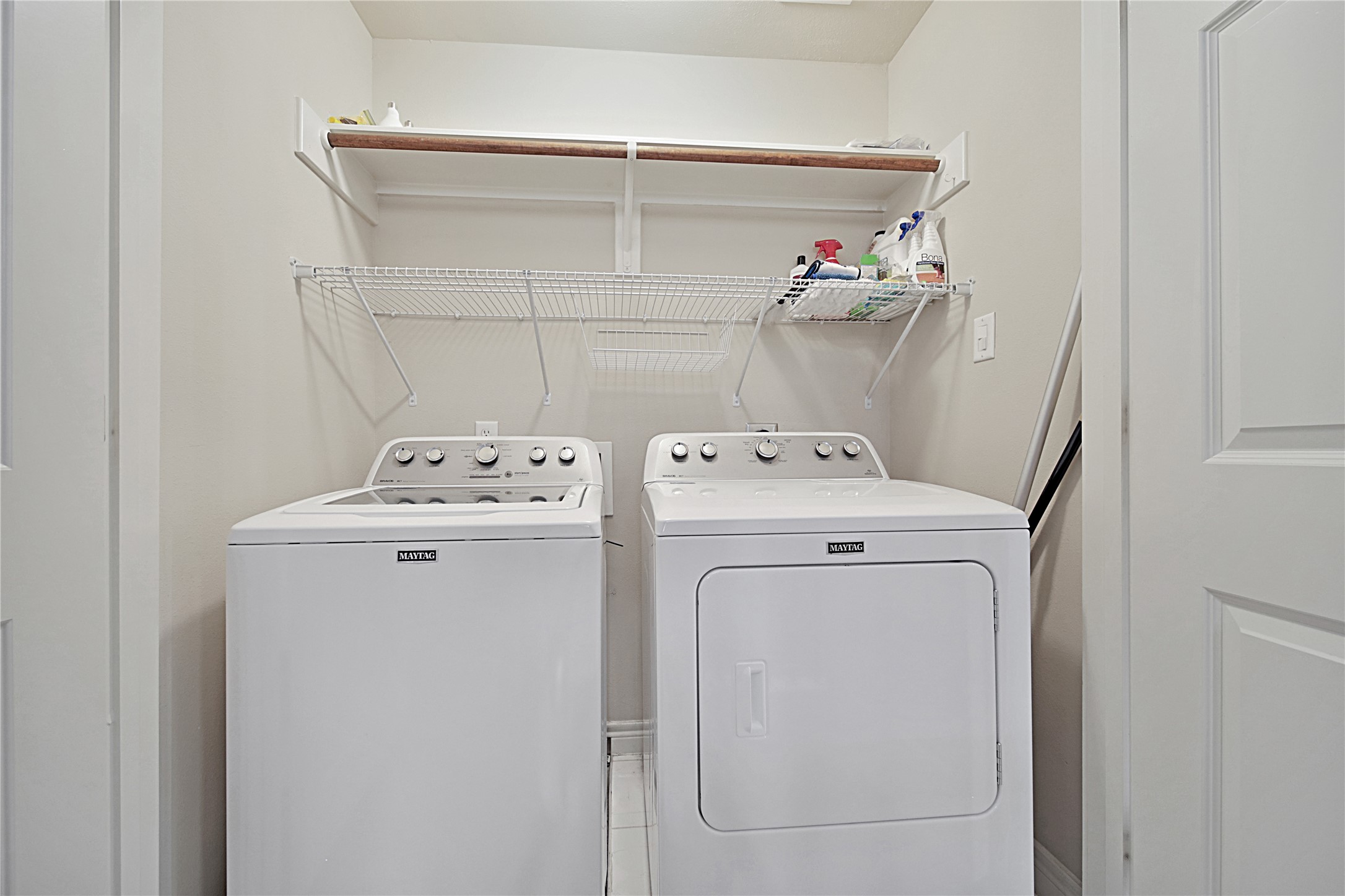 2726 Sherwin Street Houston, TX 77007 - Photo 15 of 23 Laundry space conveniently located next to the primary bedroom and living area with additional storage shelves