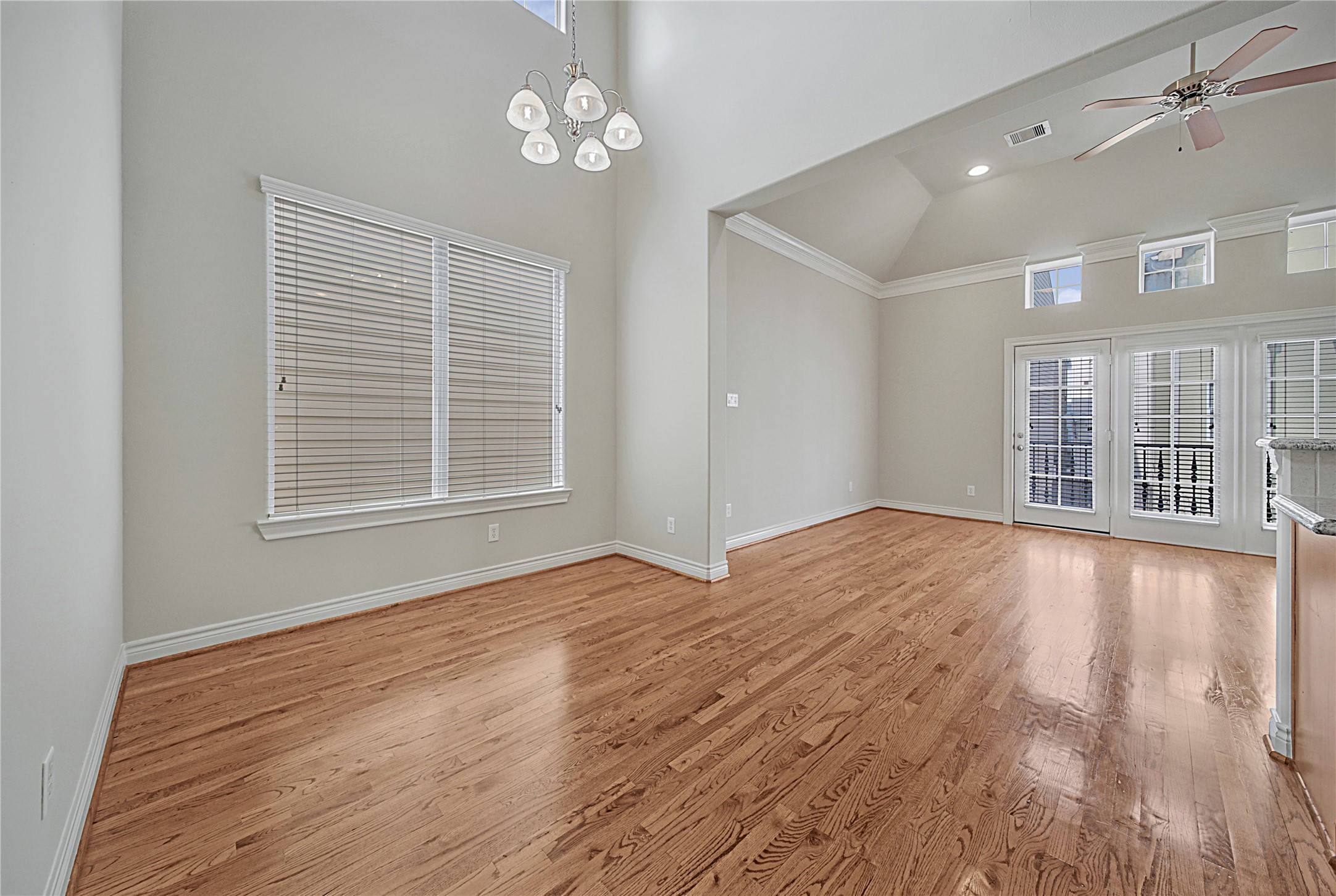 2726 Sherwin Street Houston, TX 77007 - Photo 10 of 23 Gorgeous natural lighting and hardwood floors make this open concept dining/living area inviting.
