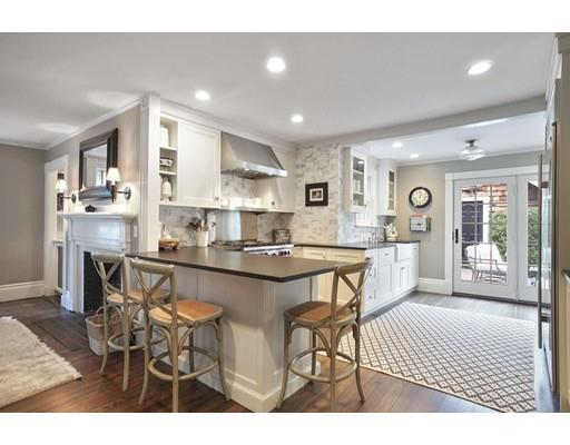 27 Pearl Street Marblehead, MA 01945 - Photo 3 of 25 a kitchen with stainless steel appliances kitchen island granite countertop a sink and cabinets