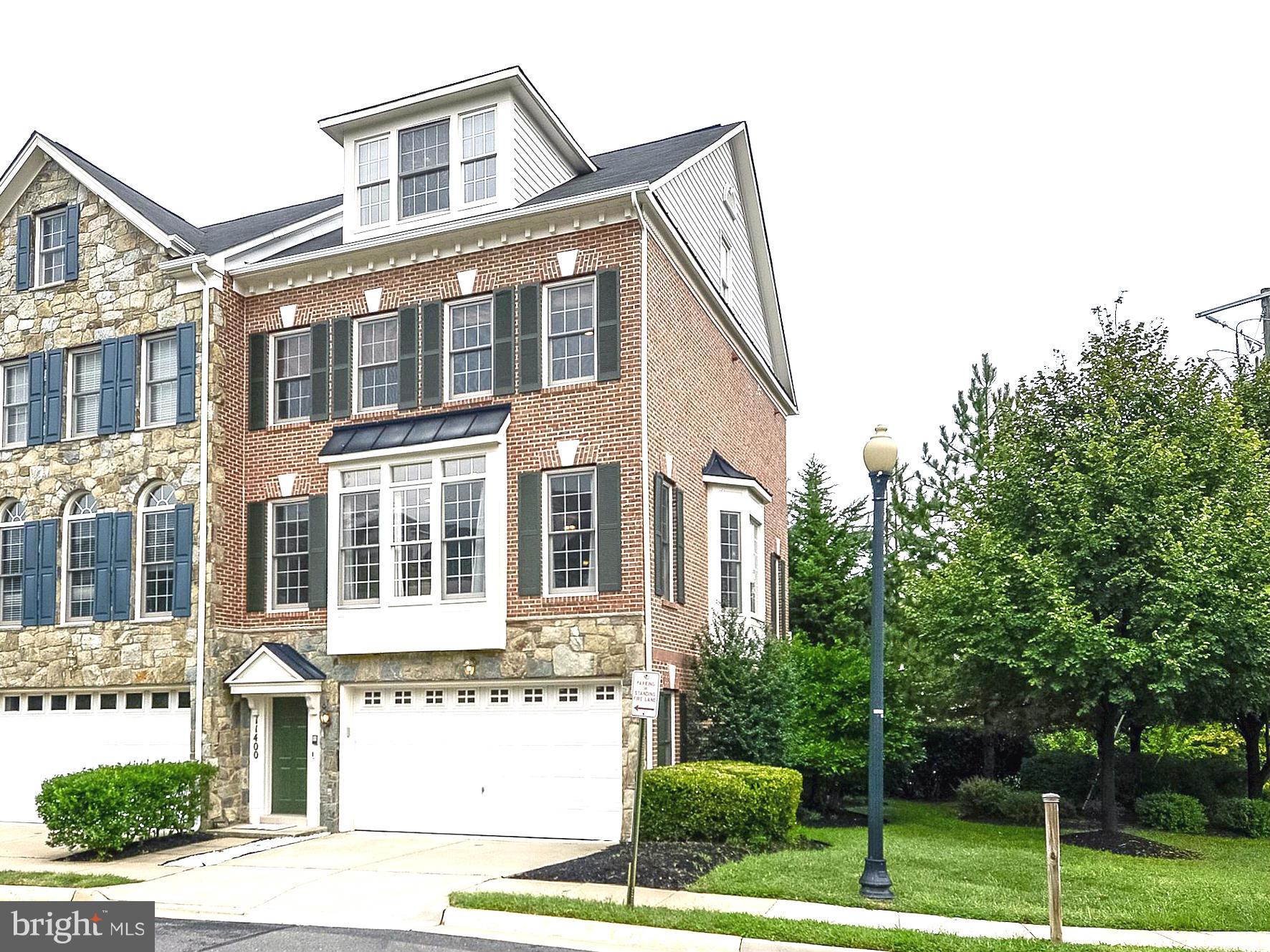 11400 Log Ridge Drive Fairfax, VA 22030 - Photo 1 of 30 a front view of a house with a yard