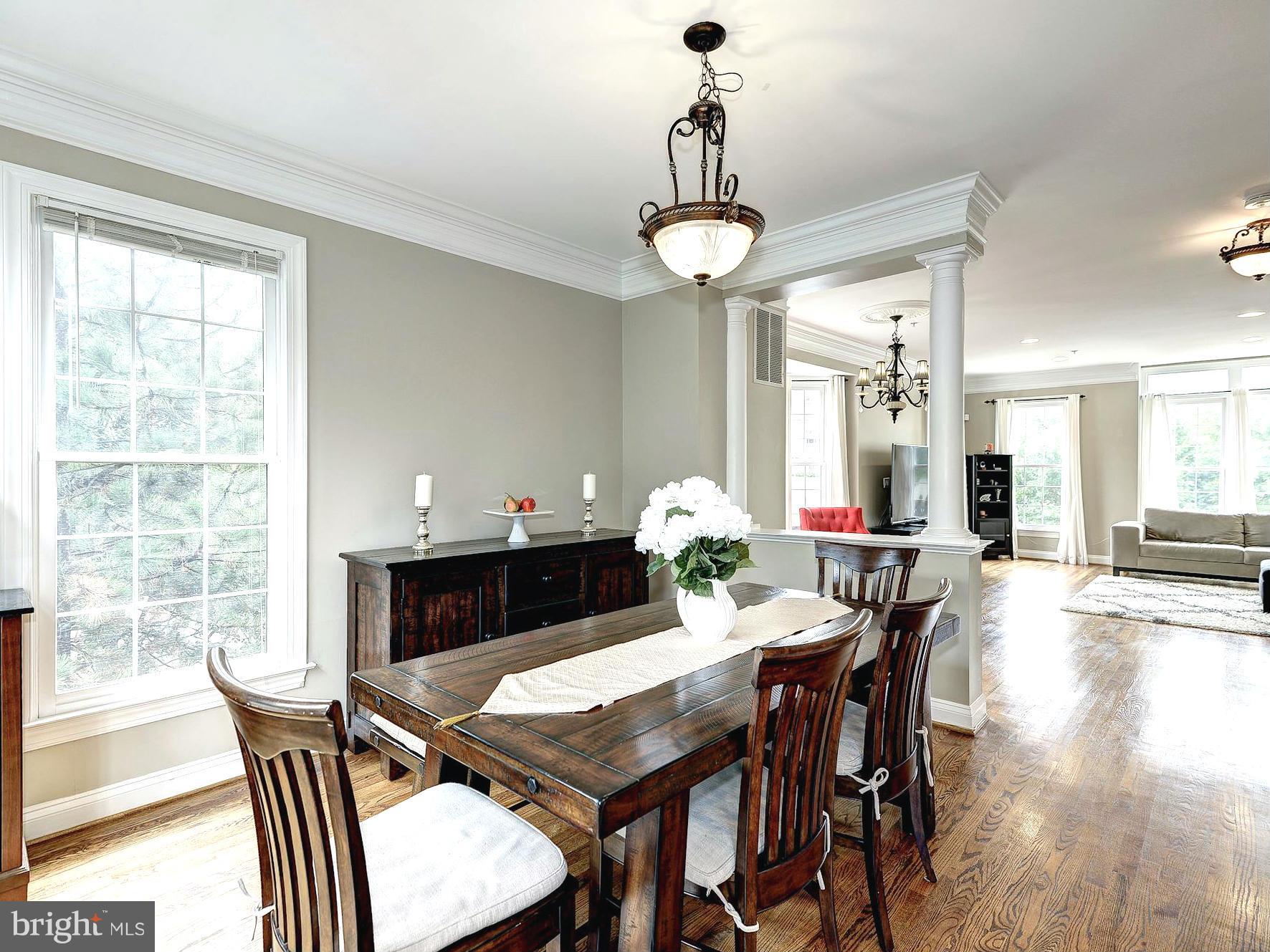 11400 Log Ridge Drive Fairfax, VA 22030 - Photo 5 of 30 a view of a dining room with furniture and wooden floor