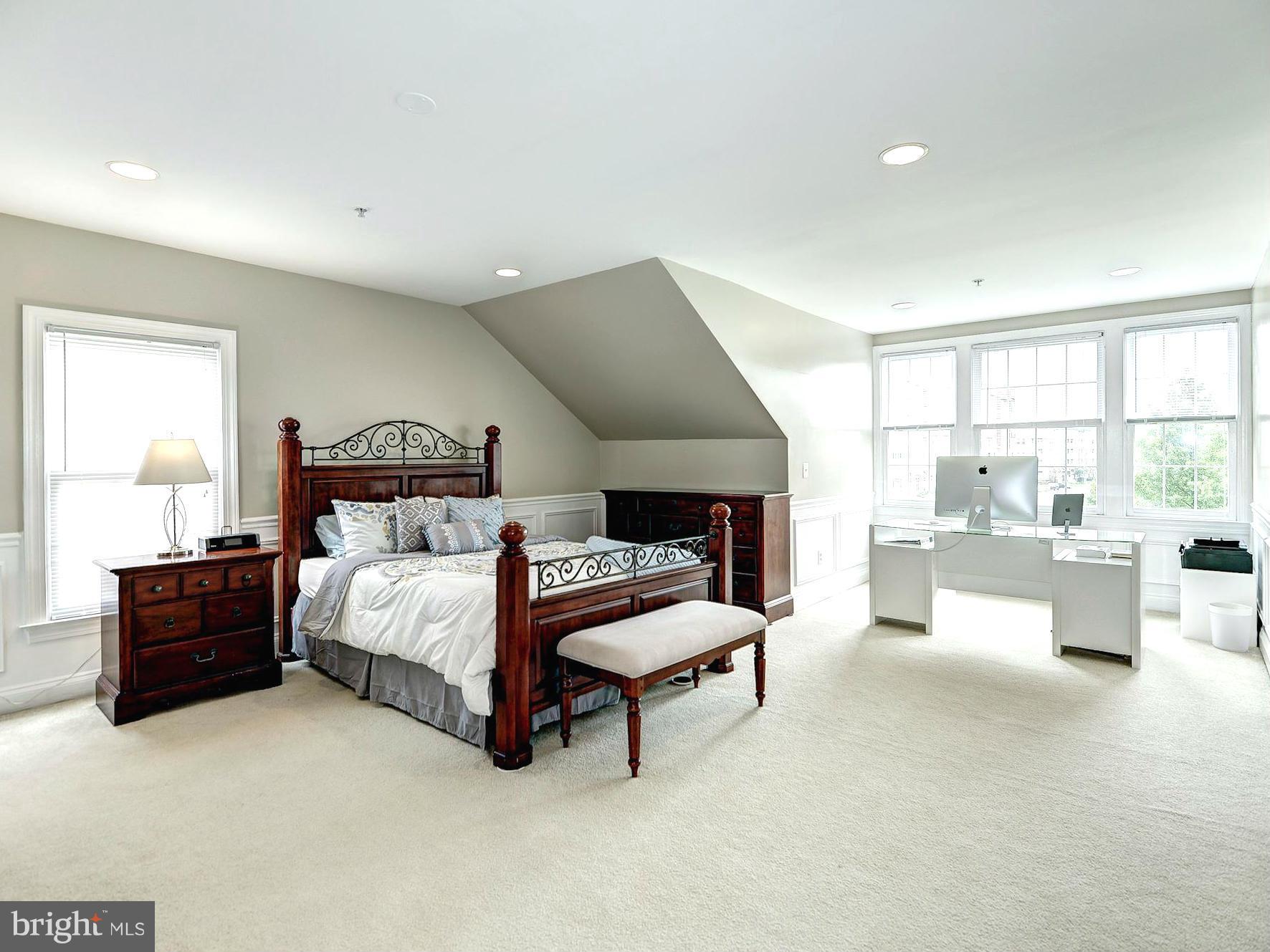 11400 Log Ridge Drive Fairfax, VA 22030 - Photo 6 of 30 a spacious bedroom with a bed and window