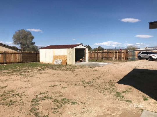 1505 South McCall Street Ridgecrest, CA 93555 - Photo 16 of 17 a view of a yard