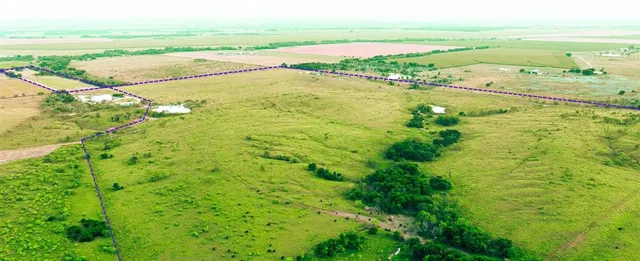 a view of an ocean and a yard