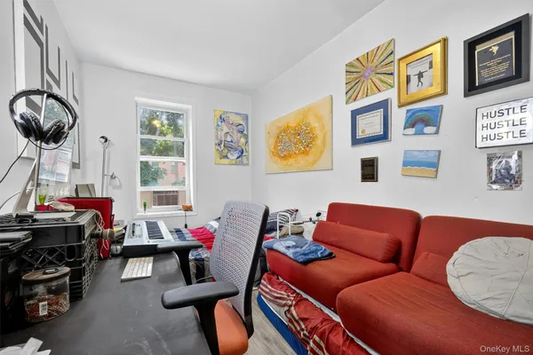 a living room with furniture and a window