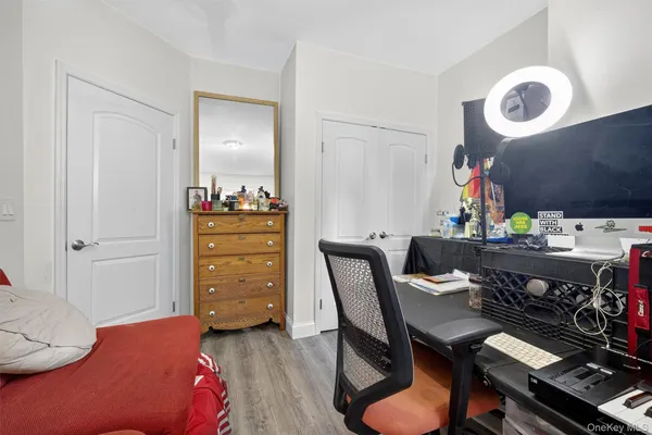 a workspace with furniture and wooden floor