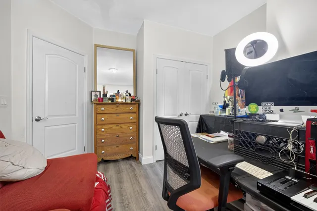 a workspace with furniture and wooden floor