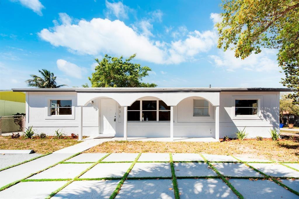 a view of pool with patio