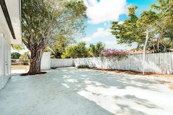 a view of a backyard of a house
