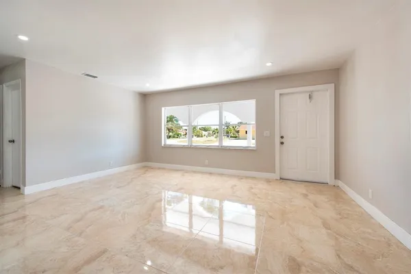 an empty room with windows