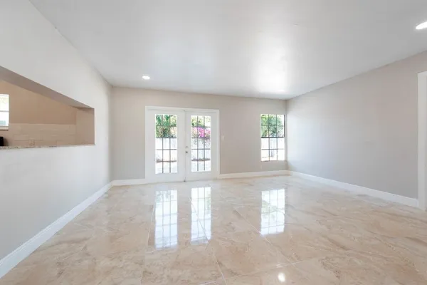 an empty room with windows