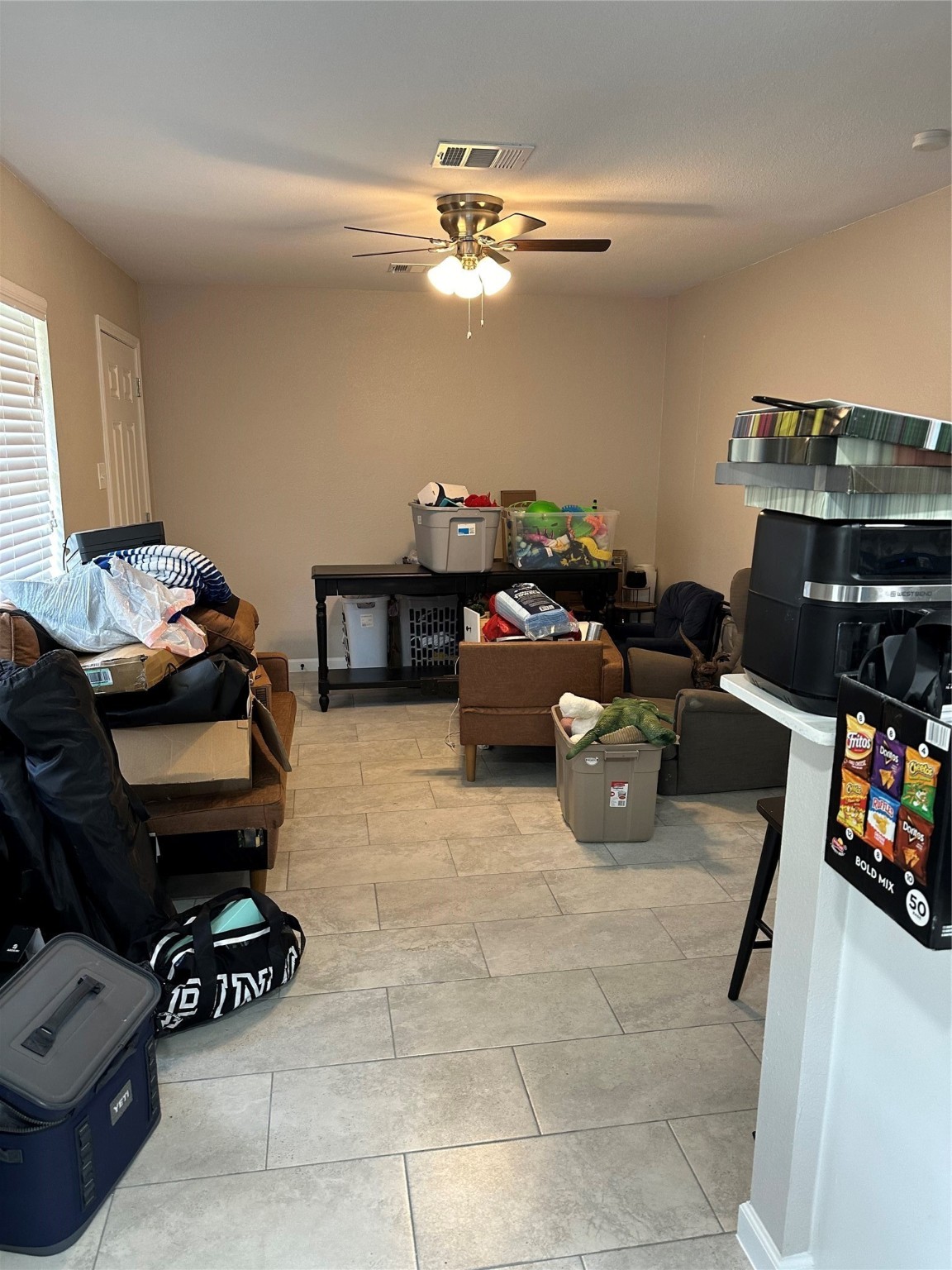 2922 Randolph Road Pasadena, TX 77503 - Photo 11 of 50 a room with furniture and a flat screen tv