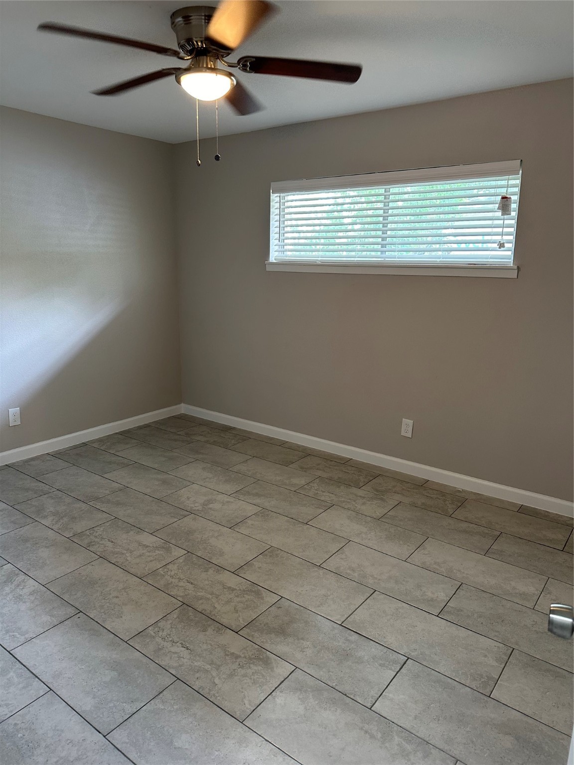 2922 Randolph Road Pasadena, TX 77503 - Photo 16 of 50 a view of an empty room with a window