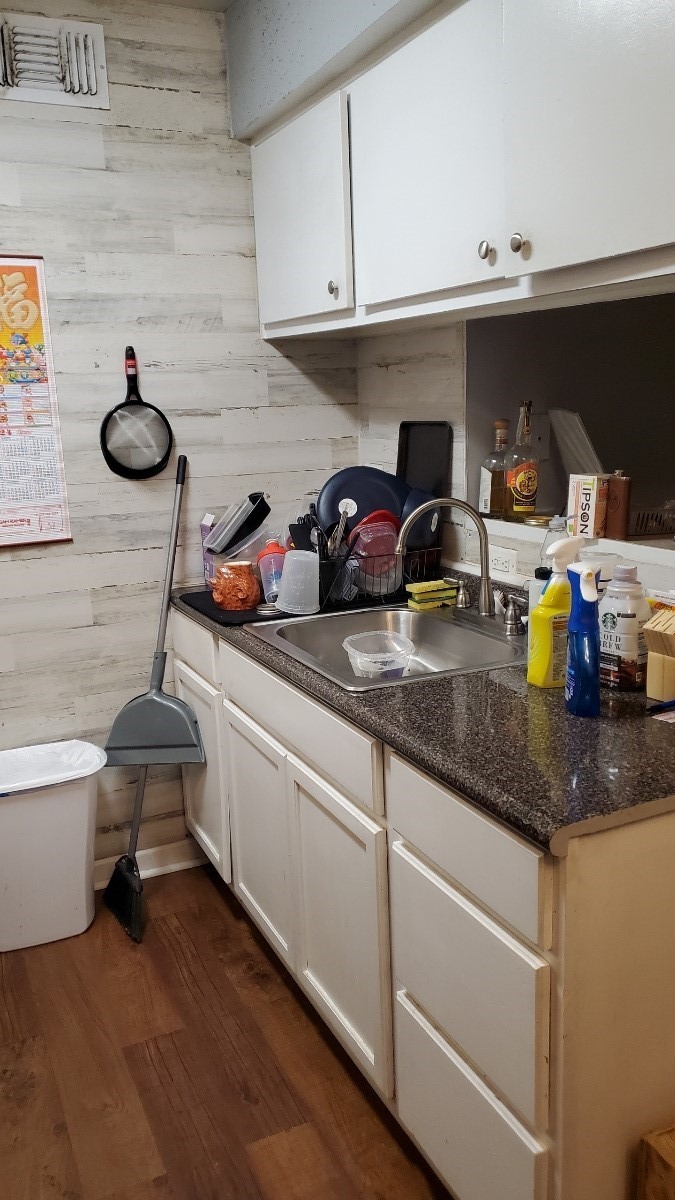 2922 Randolph Road Pasadena, TX 77503 - Photo 18 of 50 a kitchen with a sink and a stove