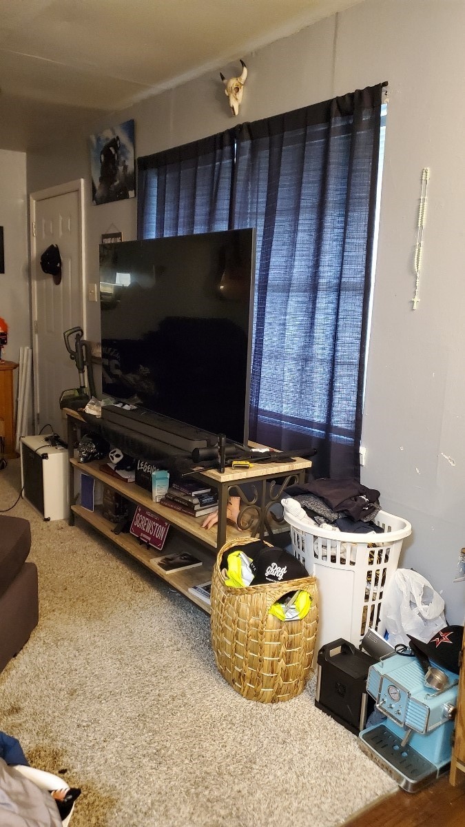 2922 Randolph Road Pasadena, TX 77503 - Photo 21 of 50 a room with furniture and flat screen tv