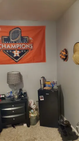 a room with furniture and air hockey table