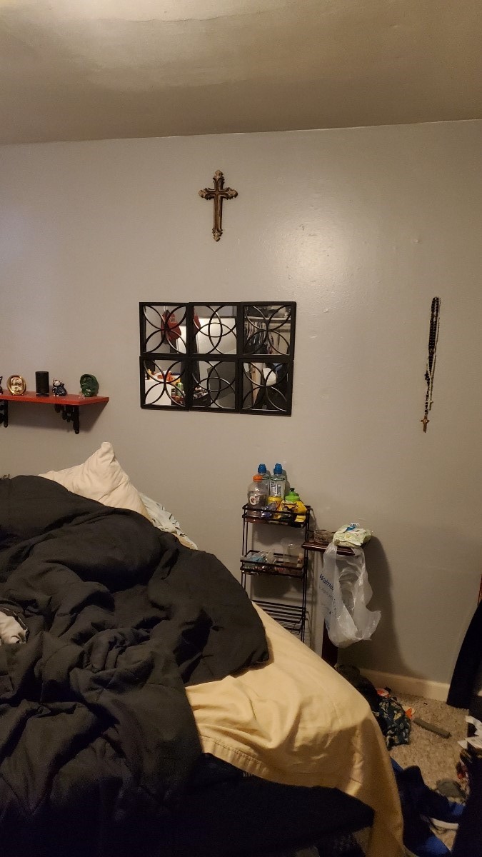 2922 Randolph Road Pasadena, TX 77503 - Photo 25 of 50 a bedroom with a bed and dresser