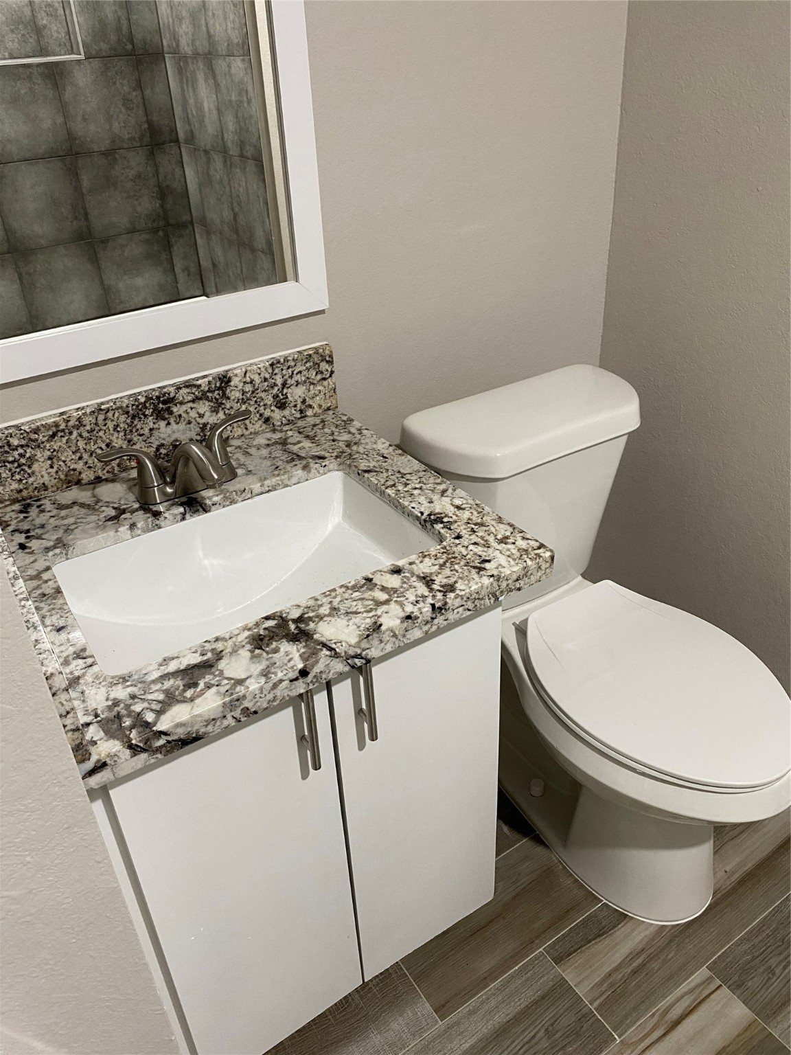 2922 Randolph Road Pasadena, TX 77503 - Photo 36 of 50 a bathroom with a sink and a toilet
