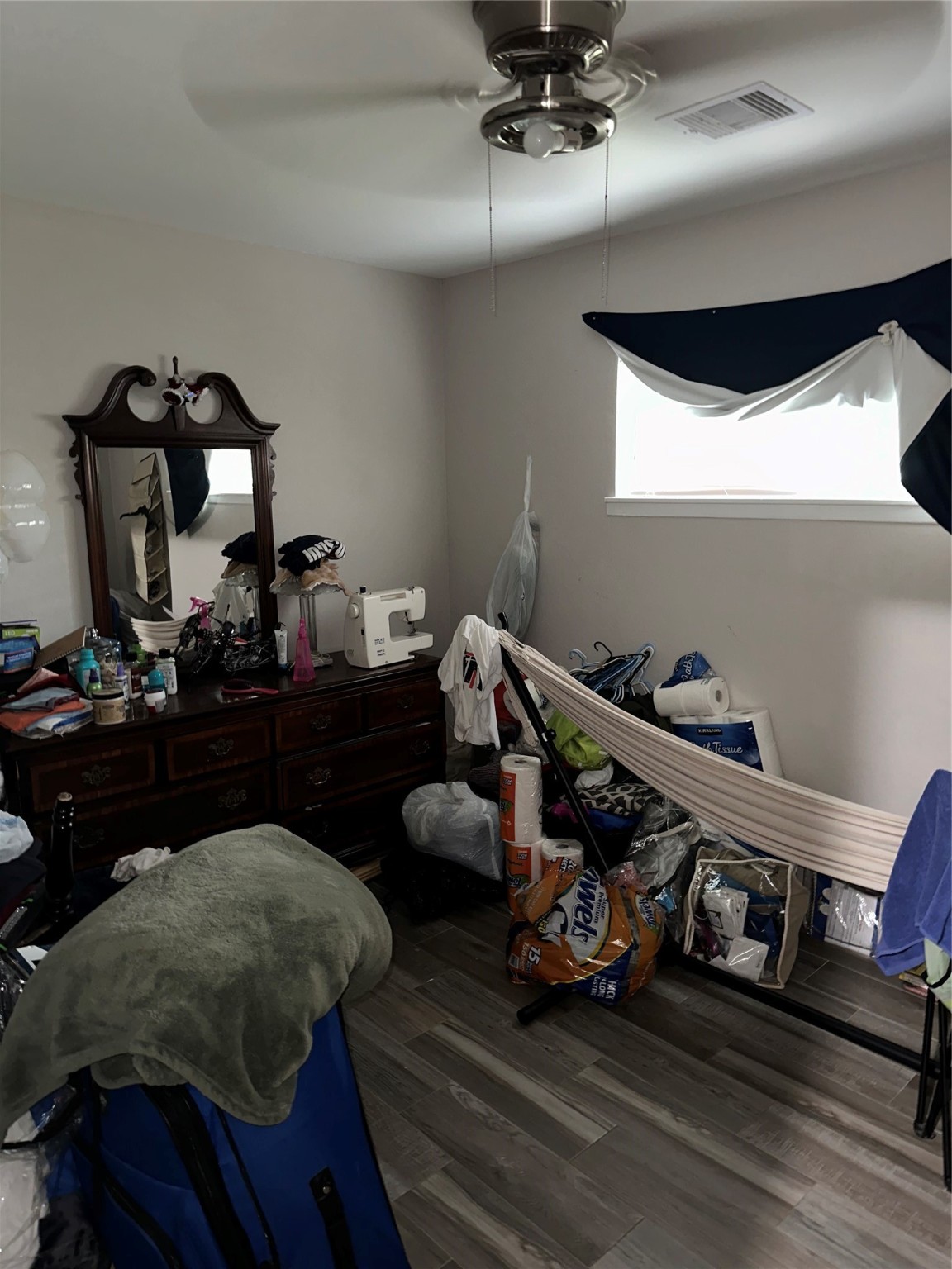 2922 Randolph Road Pasadena, TX 77503 - Photo 45 of 50 a bedroom with furniture and wooden floor