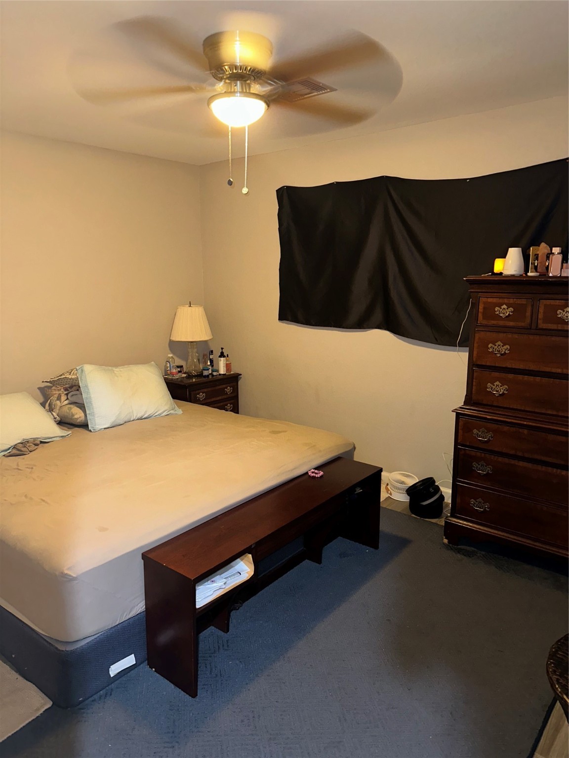 2922 Randolph Road Pasadena, TX 77503 - Photo 46 of 50 a bedroom with a bed and lamp on the dresser