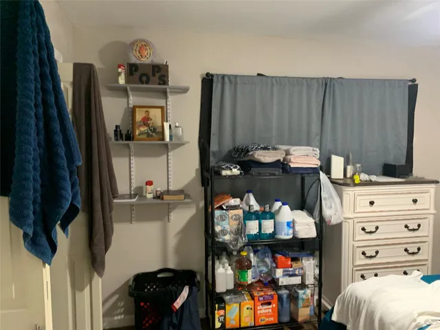a white toilet sitting next to a bathroom sink