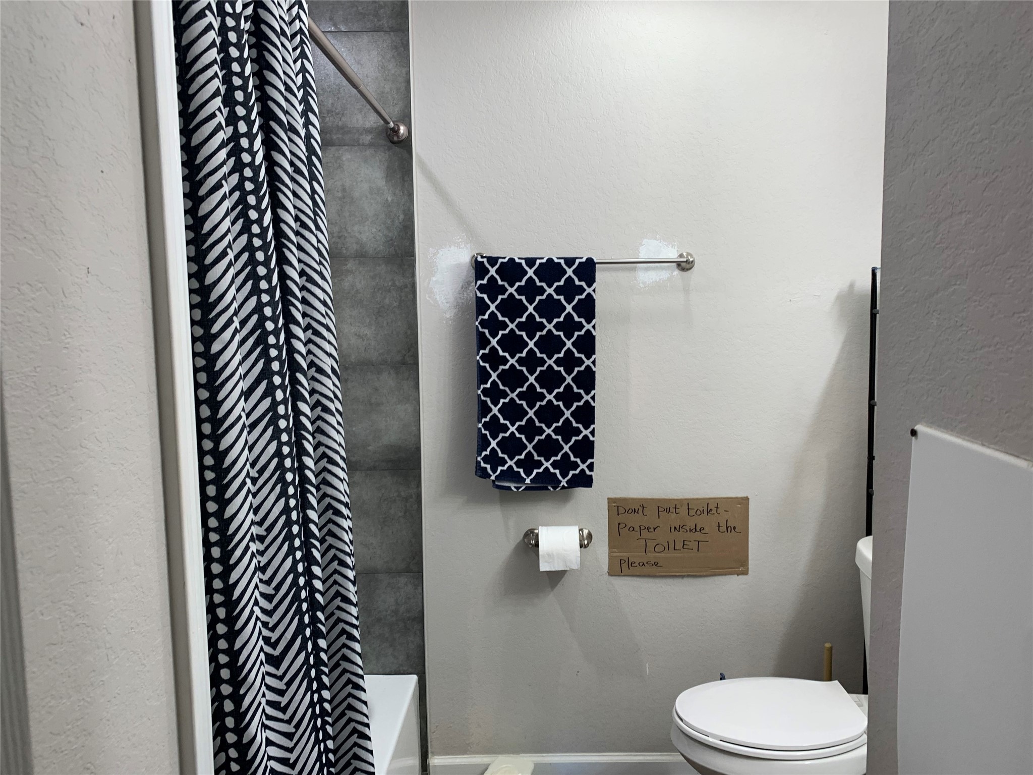 2922 Randolph Road Pasadena, TX 77503 - Photo 50 of 50 a bathroom with a toilet and a shower