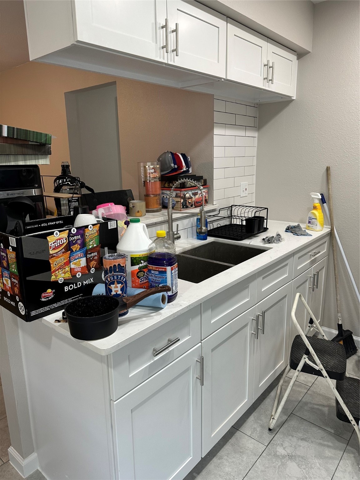 2922 Randolph Road Pasadena, TX 77503 - Photo 9 of 50 a view of a kitchen sink and cabinets