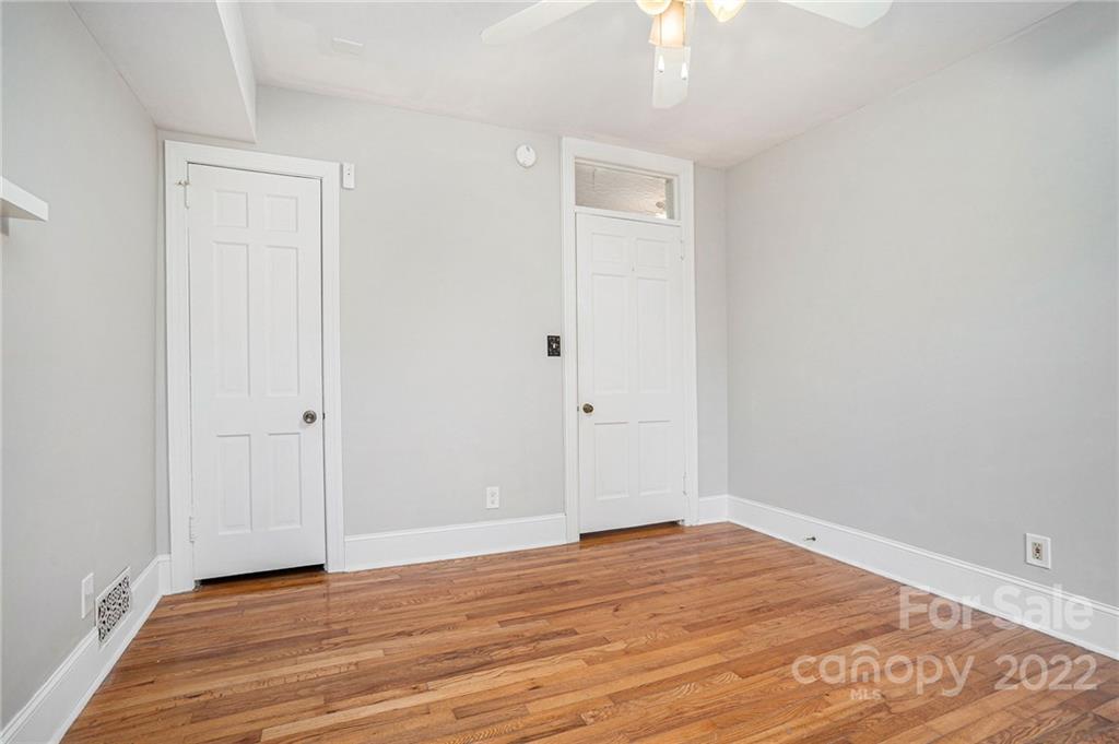 230 Providence Road Charlotte, NC 28207 - Photo 22 of 29 a view of empty room with wooden floor
