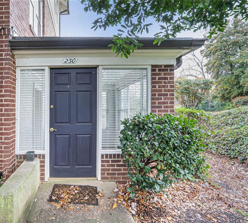 230 Providence Road Charlotte, NC 28207 - Photo 23 of 29 a front view of a house with garden