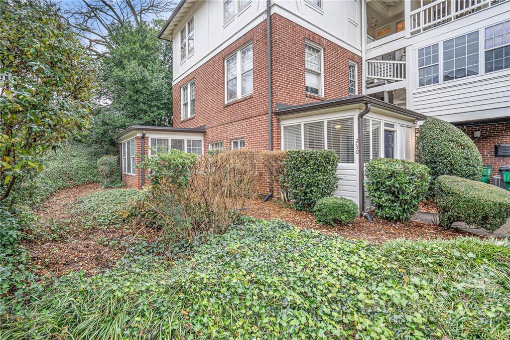 230 Providence Road Charlotte, NC 28207 - Photo 26 of 29 a front view of a house with garden