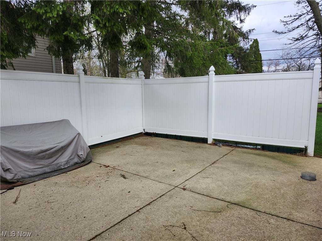 4481 Springvale Drive Cleveland, OH 44128 - Photo 4 of 4 View of patio with fence