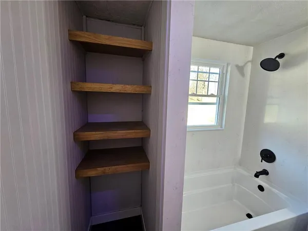 a bathroom with a sink and a toilet