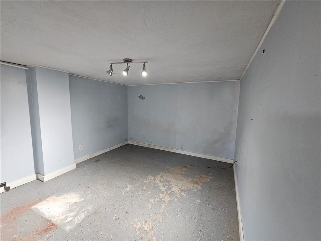 908 New Castle Road Butler, PA 16001 - Photo 16 of 23 a view of a room with an empty space