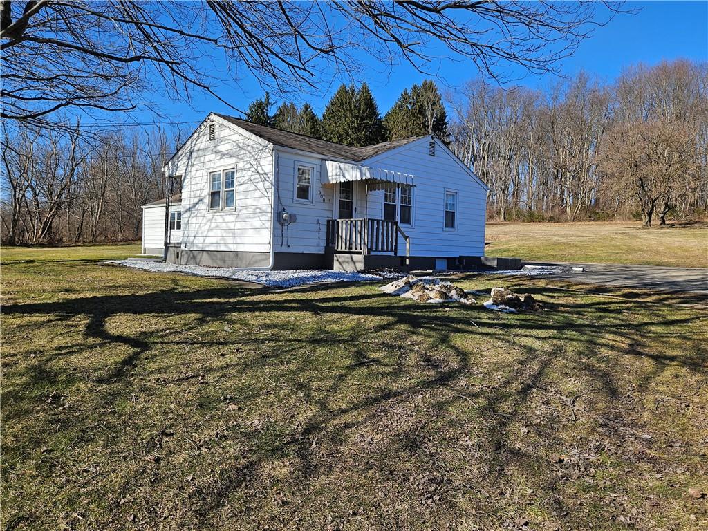 908 New Castle Road Butler, PA 16001 - Photo 2 of 23 a view of a house with a yard