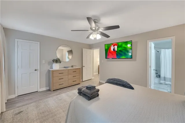 a bedroom with a bed and a dresser