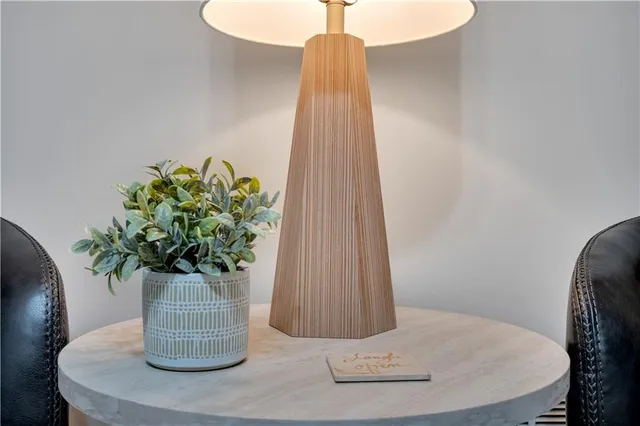 a vase of flowers sitting on a table