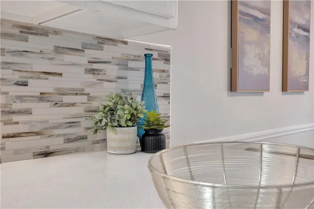 a white bath tub sitting in a bathroom