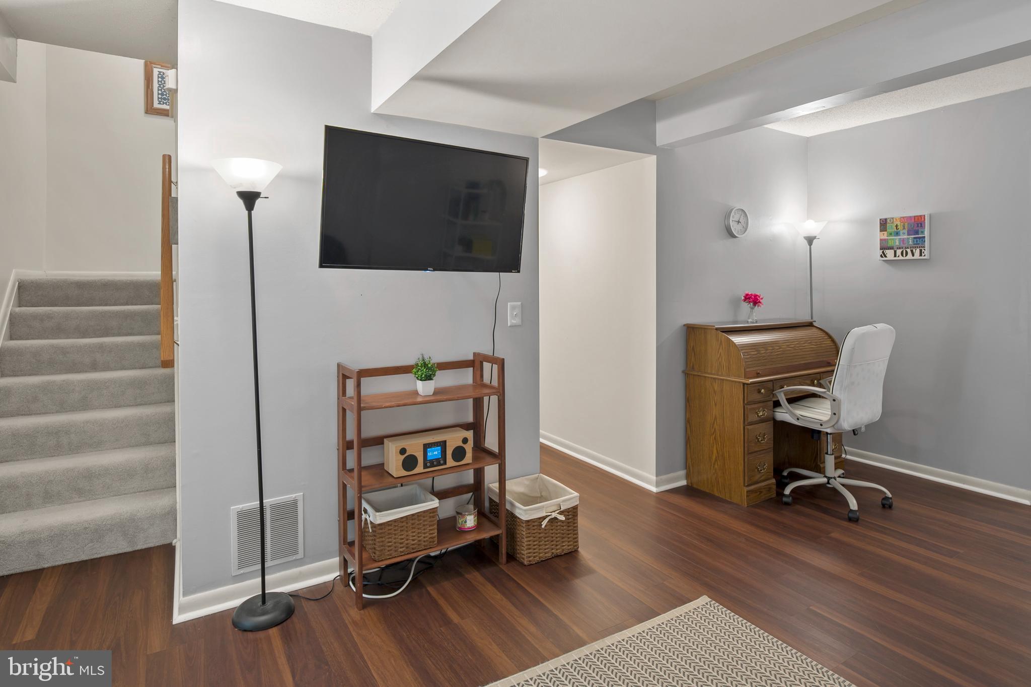 5513 Vantage Point Road, Unit 36 Columbia, MD 21044 - Photo 33 of 49 Spacious recreation room with new flooring