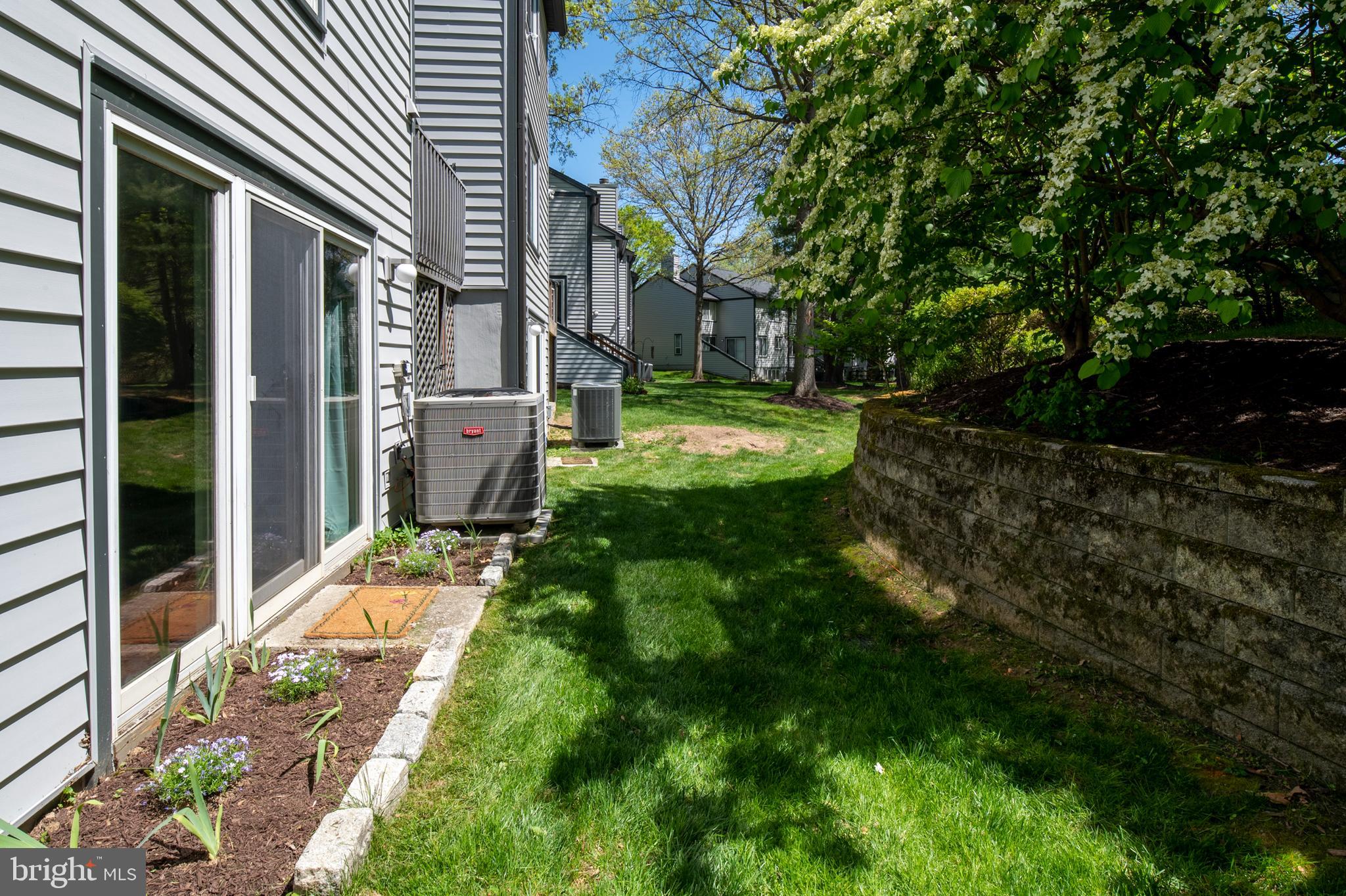 5513 Vantage Point Road, Unit 36 Columbia, MD 21044 - Photo 40 of 49 Enjoy the lush green grass & budding flowers
