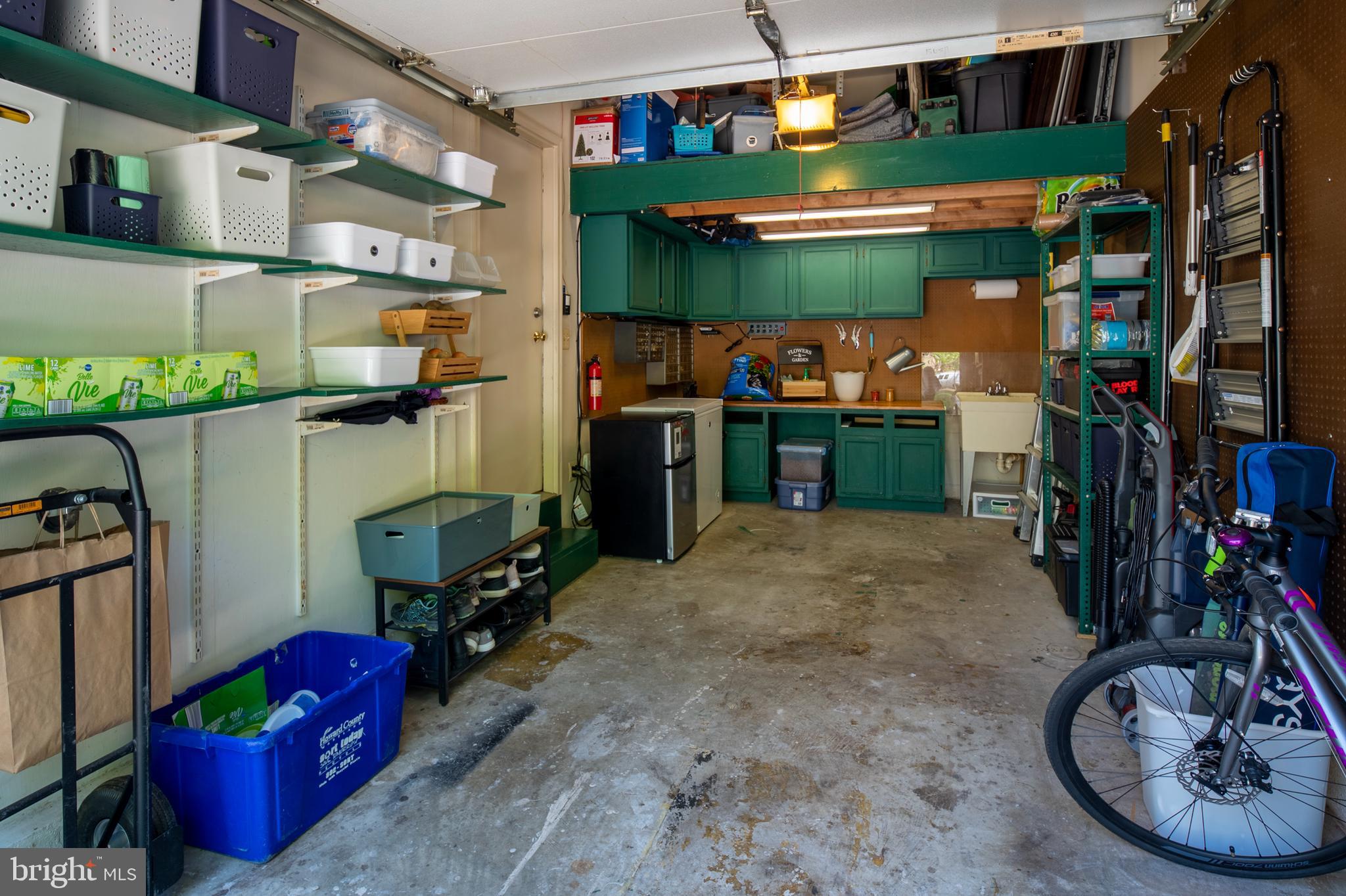 5513 Vantage Point Road, Unit 36 Columbia, MD 21044 - Photo 44 of 49 More storage in the garage along with a workshop