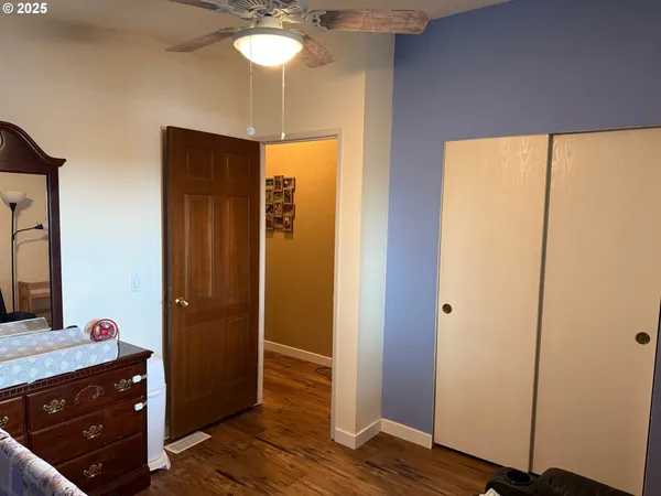 a view of a bathroom from a hallway