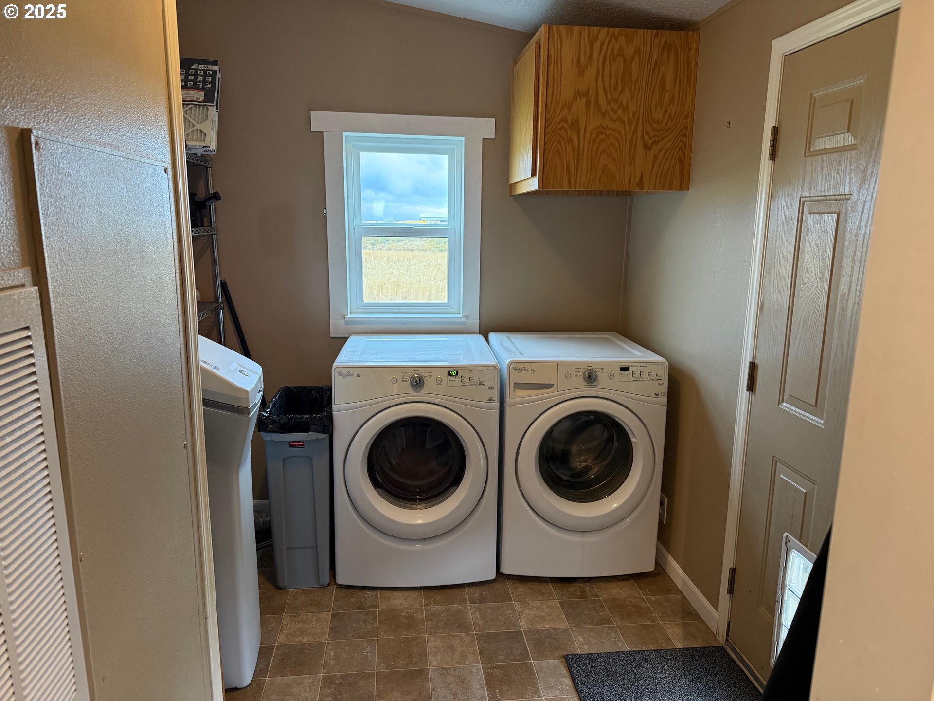 87479 North Star Lane Christmas Valley, OR 97641 - Photo 19 of 30 a utility room with dryer and washer