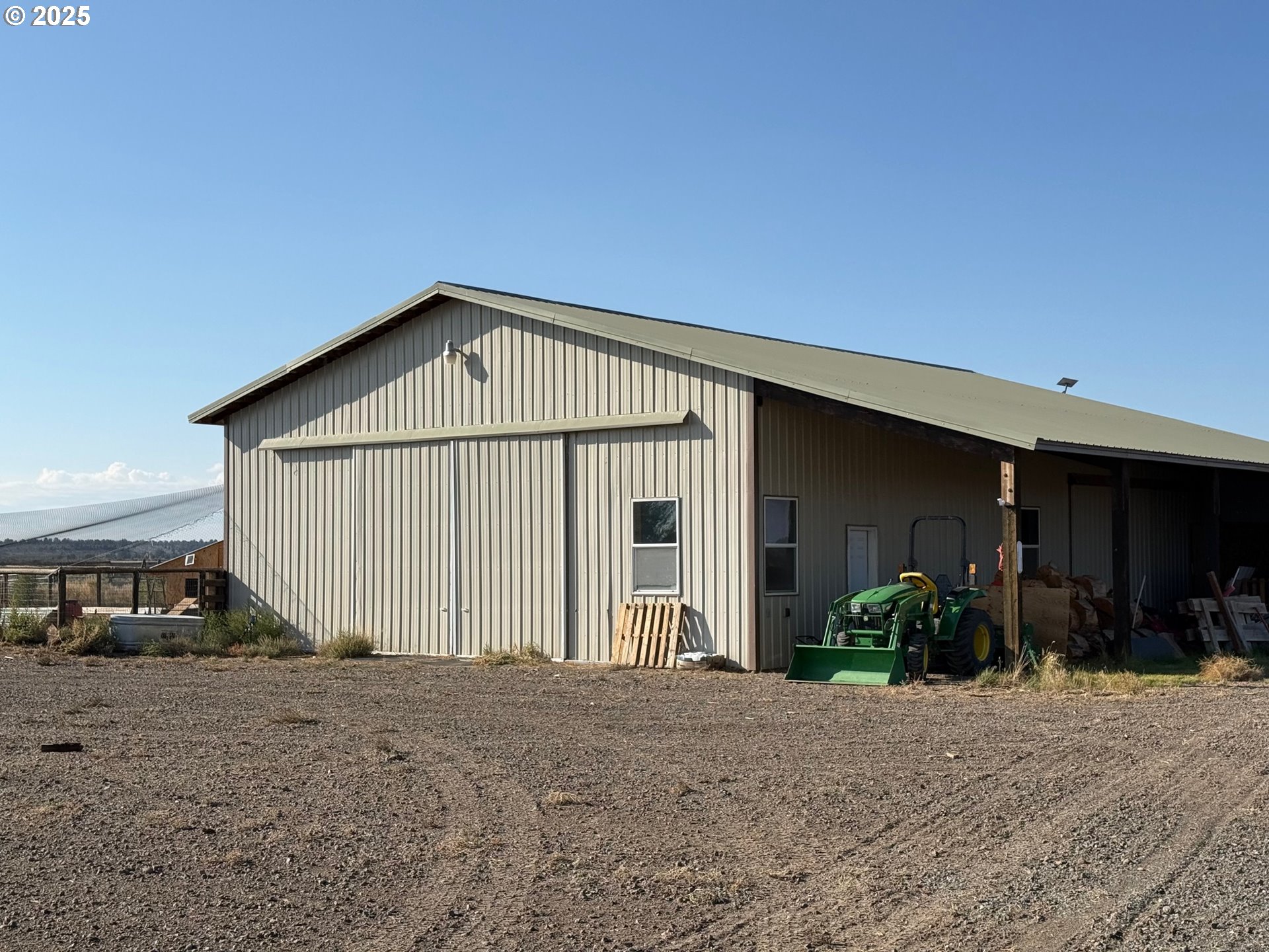 87479 North Star Lane Christmas Valley, OR 97641 - Photo 20 of 30 a front view of a house with a yard
