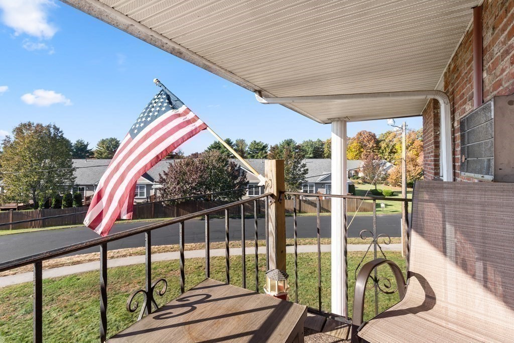 18 Woodman Way, Unit 17 Newburyport, MA 01950 - Photo 16 of 24 a view of staircase with a flower garden